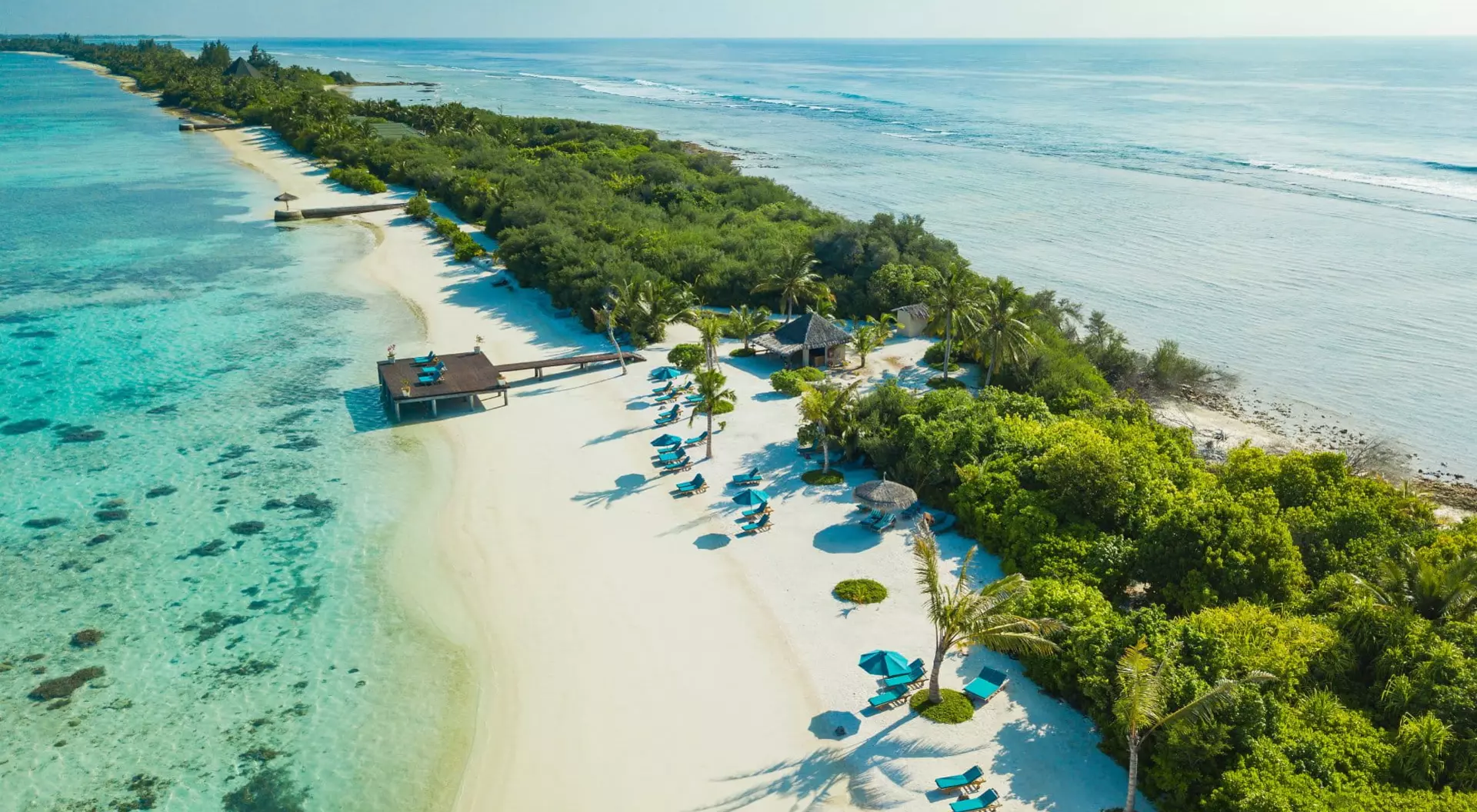 aerial view of pristine white-sand beach in the Maldives