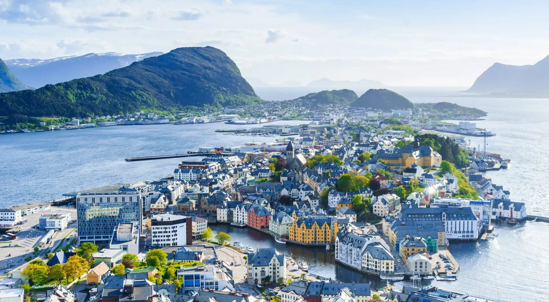 Aerial view of Alesund in Norway, where the famous fjord of Geirangerfjord begins its journey into the mainland.