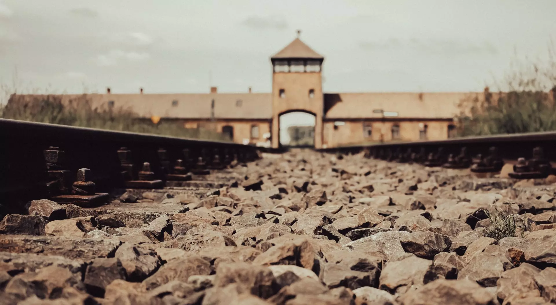 Gate to concentration camp Auschwitz, Oswiecim. Rail entrance to Auschwitz. Holocaust memorial.
