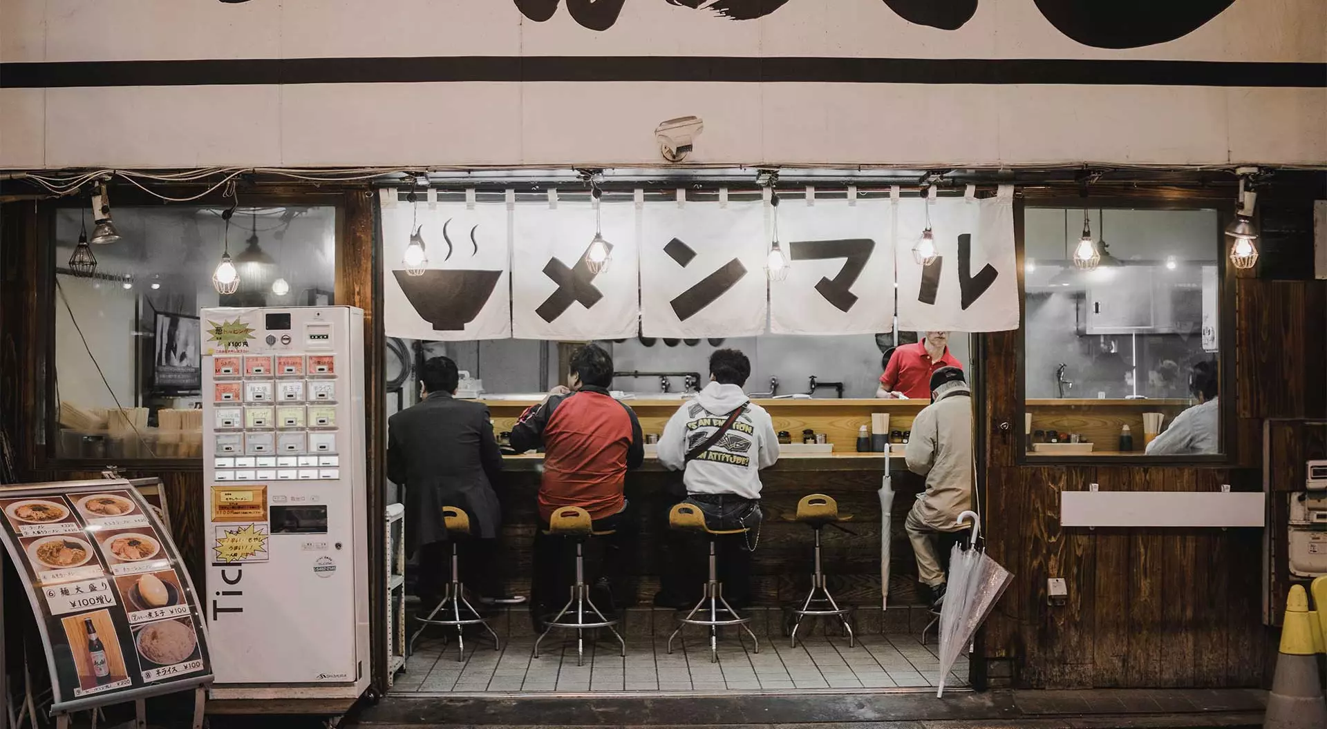 Tokyo, Japan sushi restaurant with men sitting at the counter