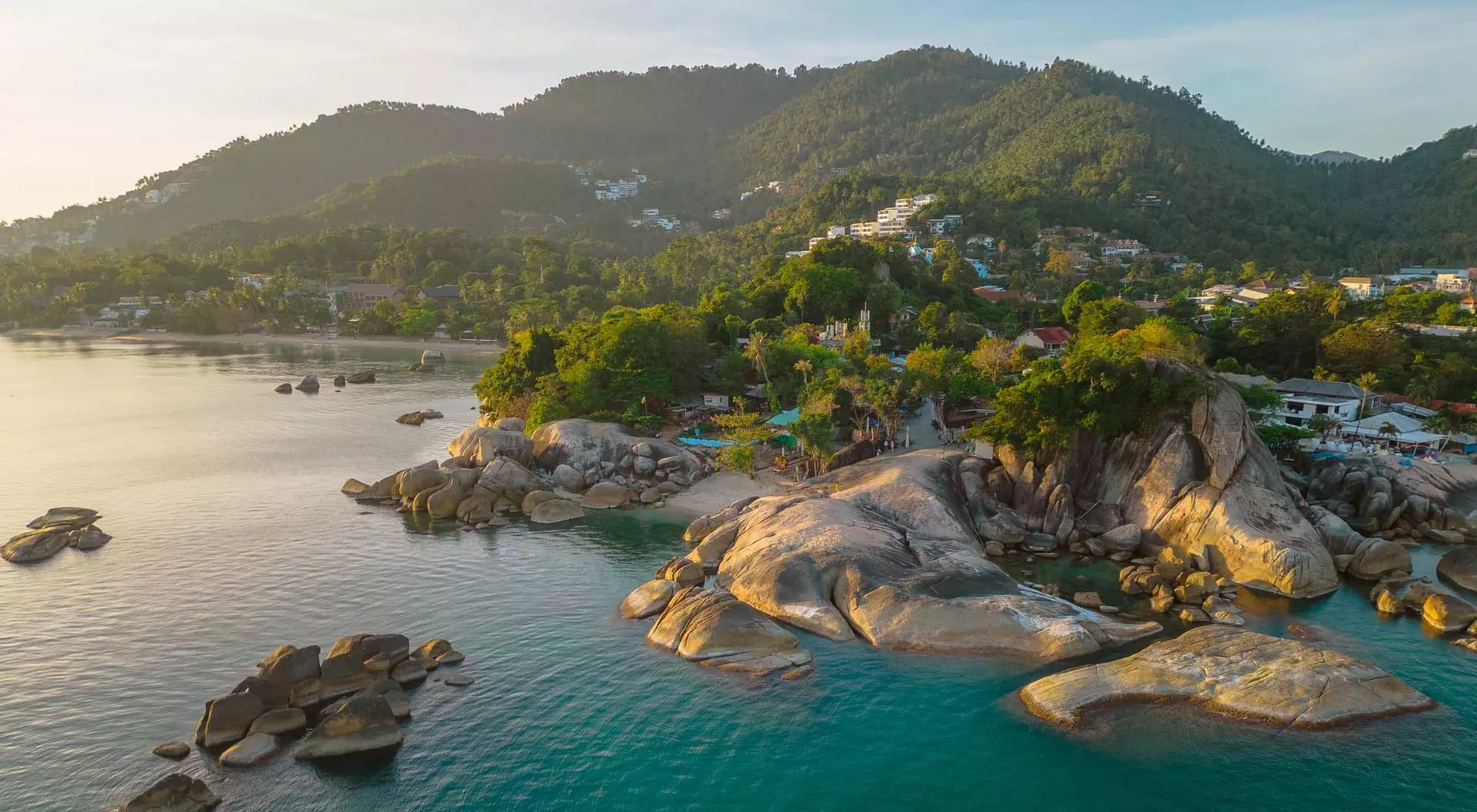 An aerial view of buildings on the edge of the water in Koh Samui, Thailand