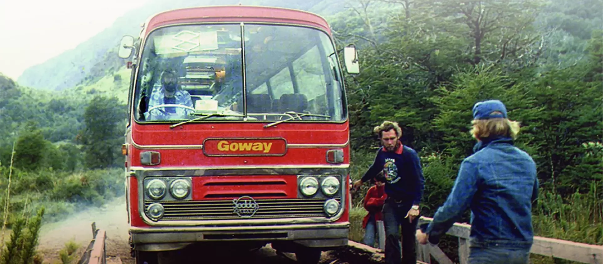 A vintage photo of the Goway van crossing a bridge on an overland trip in South America in the 1970s