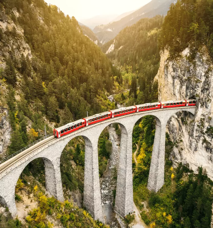 Train crossing Landwasser Viaduct on rhaetian railway in Filisur – Albula, Graubunden, Switzerland
