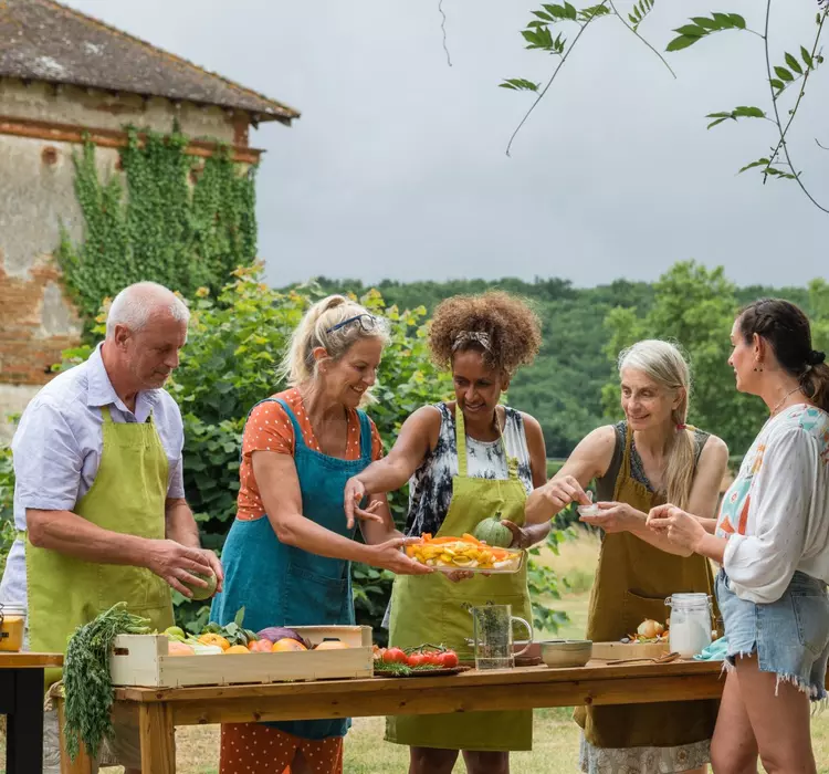 Montauban, France A group enjoying a cooking class experience while on holiday in Montauban, France