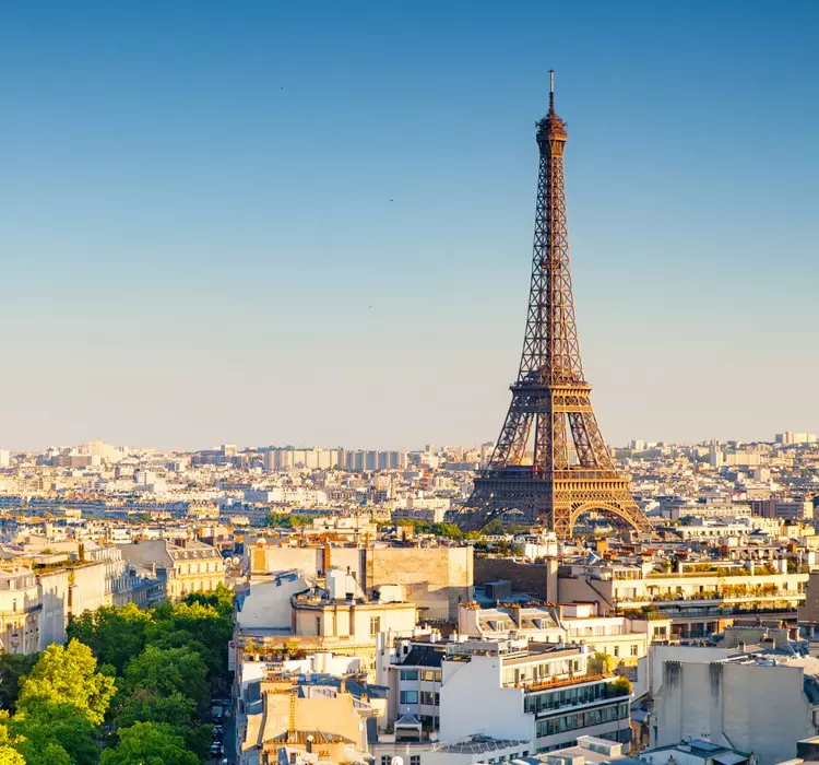 Cityscape of Paris and the Eiffel Tower at sunset