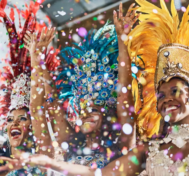 Cropped shot of samba dancers performing in Brazil carnival with their band