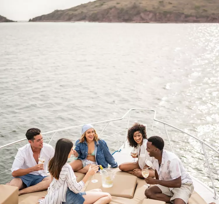 Friends gather on a luxury yacht