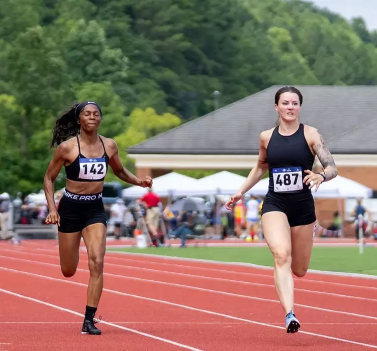 Three women racing in the World Police & Fire Games