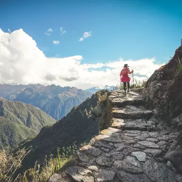 A person hiking the Inca Trail high in the mountains of Peru