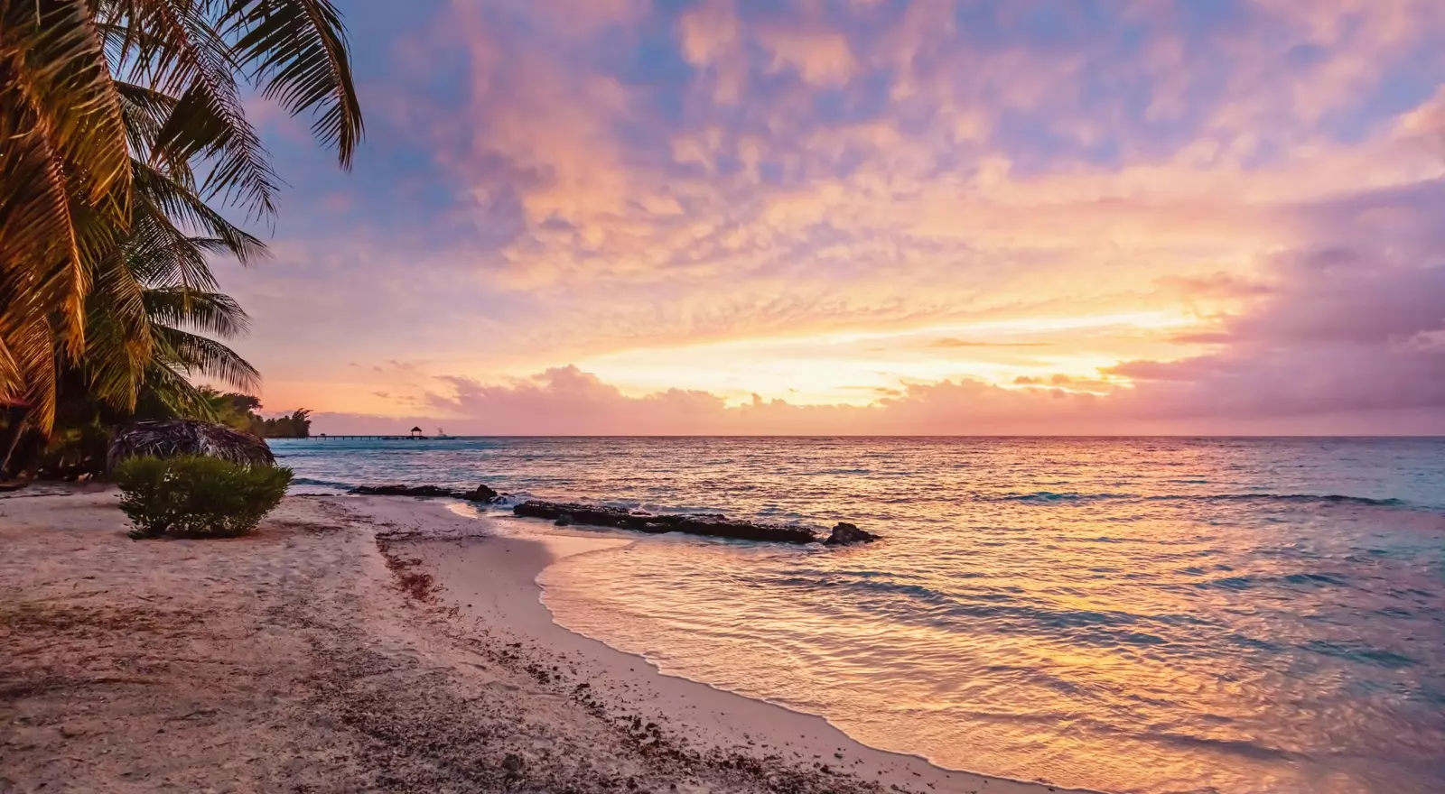 Colorful vibrant sunset over the pacific ocean at scenic natural beach