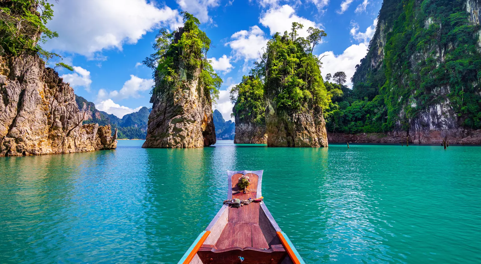 Mountains and view from aboard a boat on the Phrasaeng river