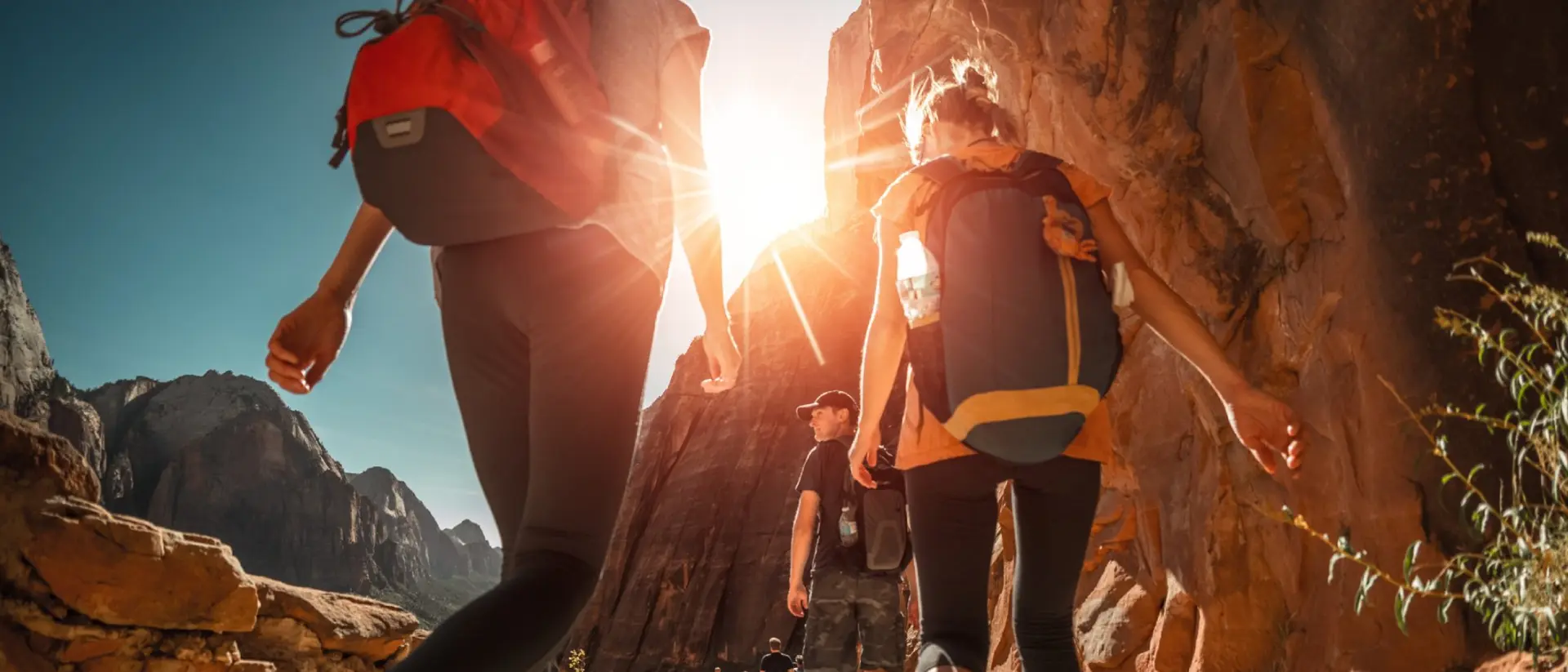 A team hiking through a canyon