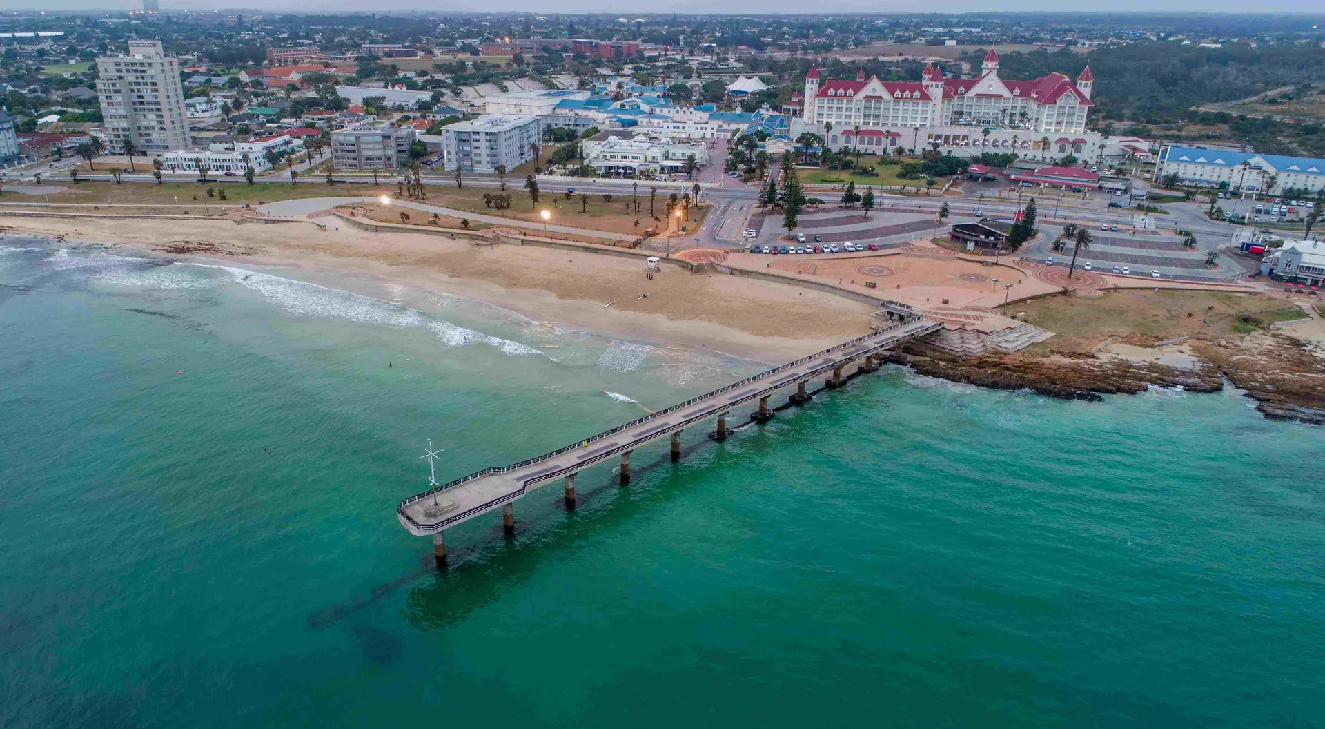 Shark Rock Pier Aerial view of Shark Rock Pier in Port Elizabeth, South Africa. The pier juts out into Algoa Bay, with the city skyline in the background.