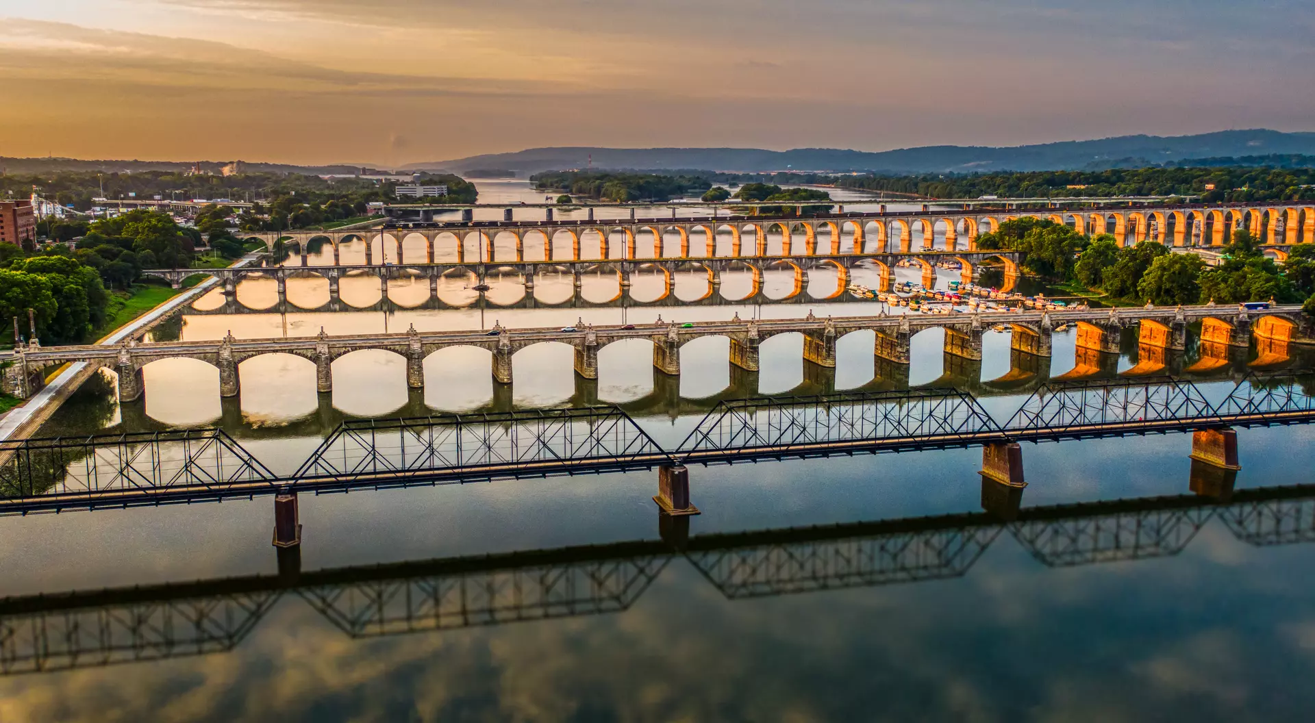Harrisburg Many bridges over river in sunset, Harrisburg, Pennsylvania, Susquehanna River crossings aerial view