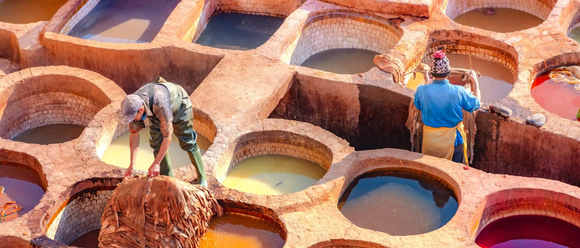 Leather dying in a traditional tannery. Leather dying in a traditional tannery in the city of Fez, Morocco