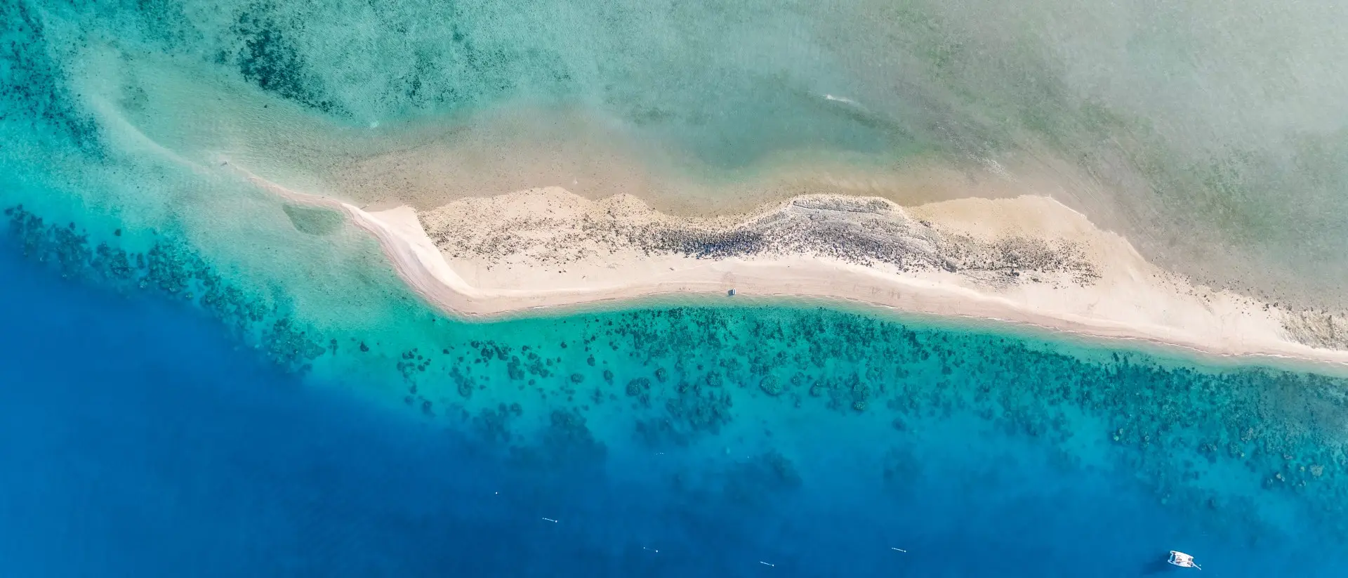 Whitsunday Islands High angle aerial drone view of the sandbar and blue waters