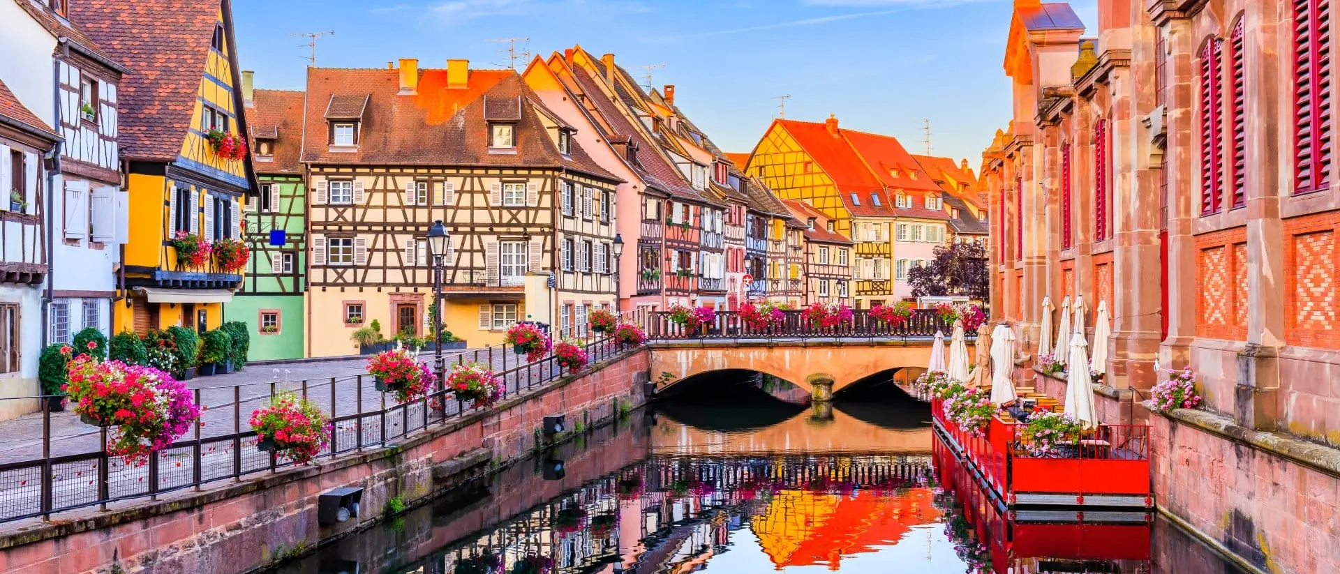 Colmar, Alsace, France - Water canal and traditional half timbered houses