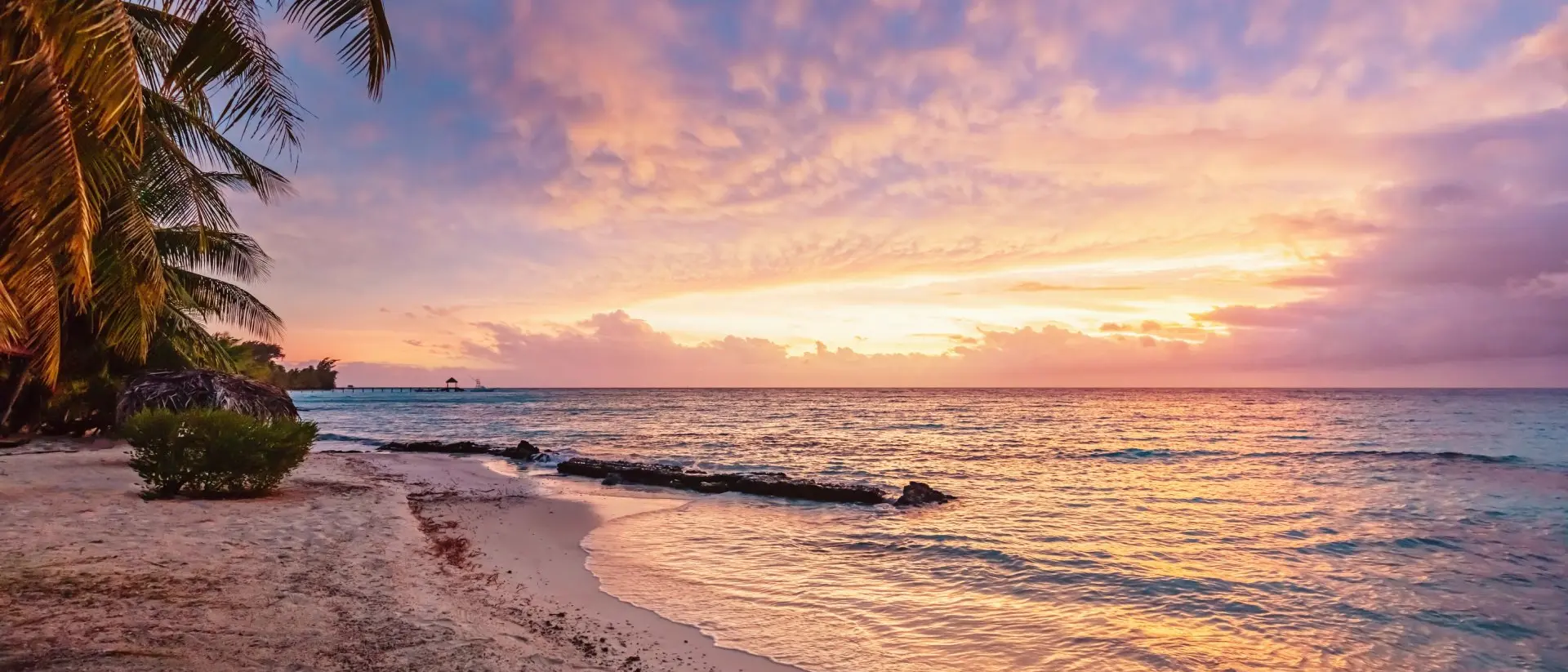 Colorful vibrant sunset over the pacific ocean at scenic natural beach