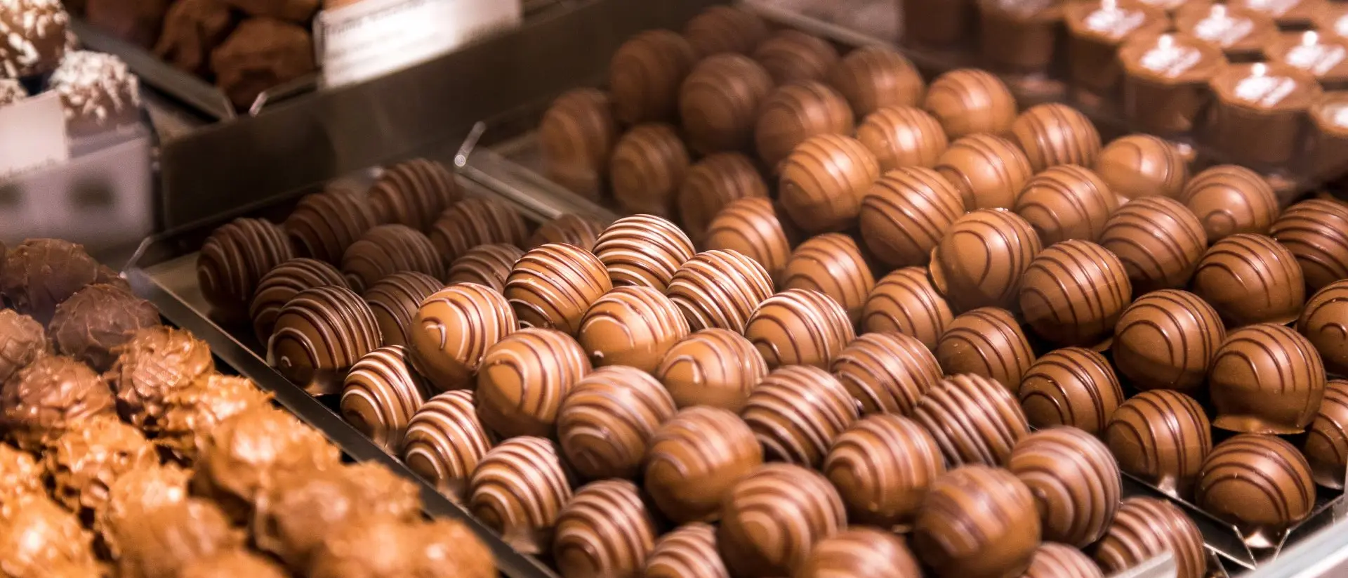 Swizerland Depicting a selection of fresh Swiss chocolates and truffles on display inside a Swiss chocolate store