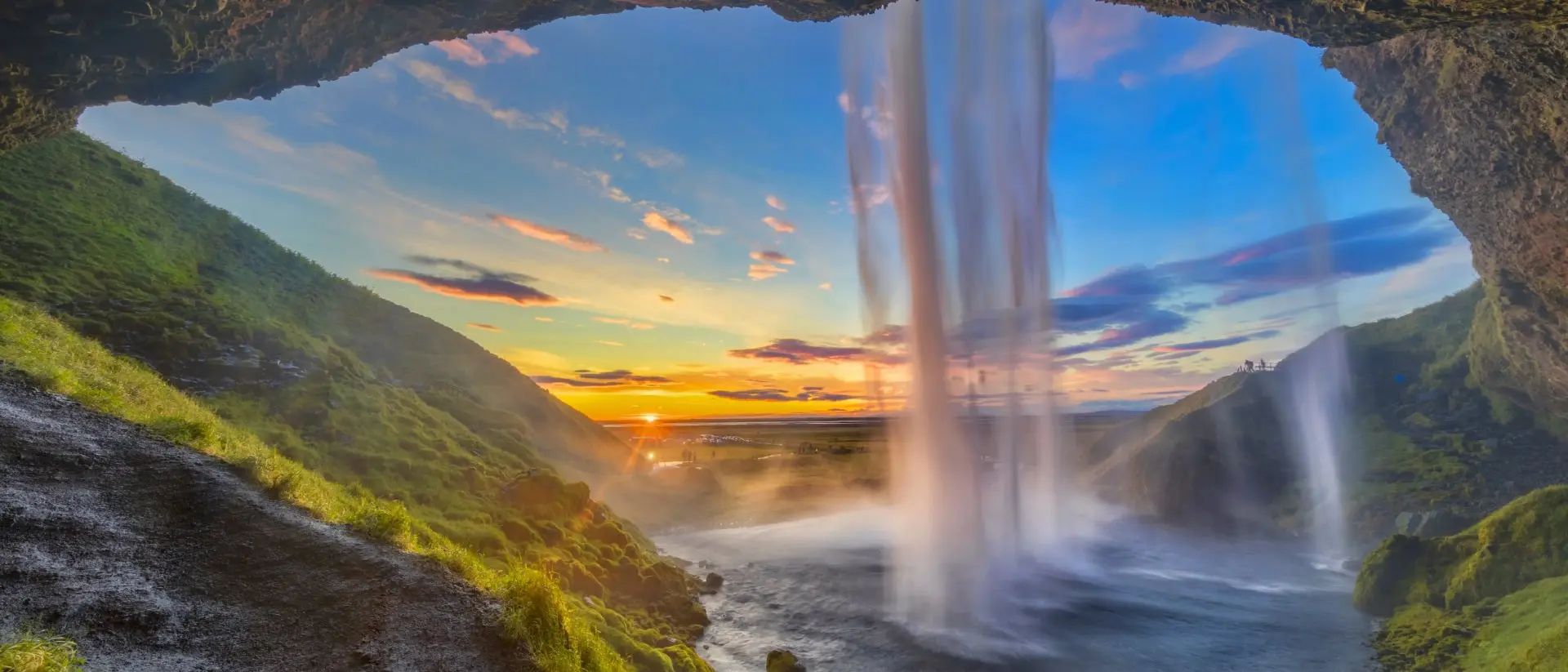 Flowing water cascading down at sunset