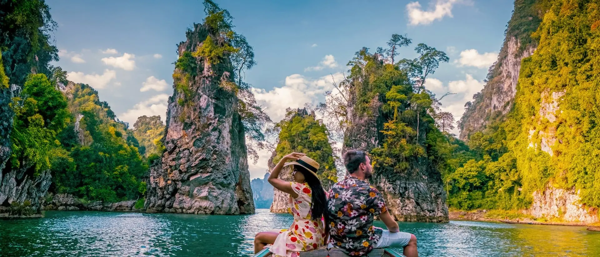 In Khao Sok National Park in Thailand you can boat among towering lime stone cliffs