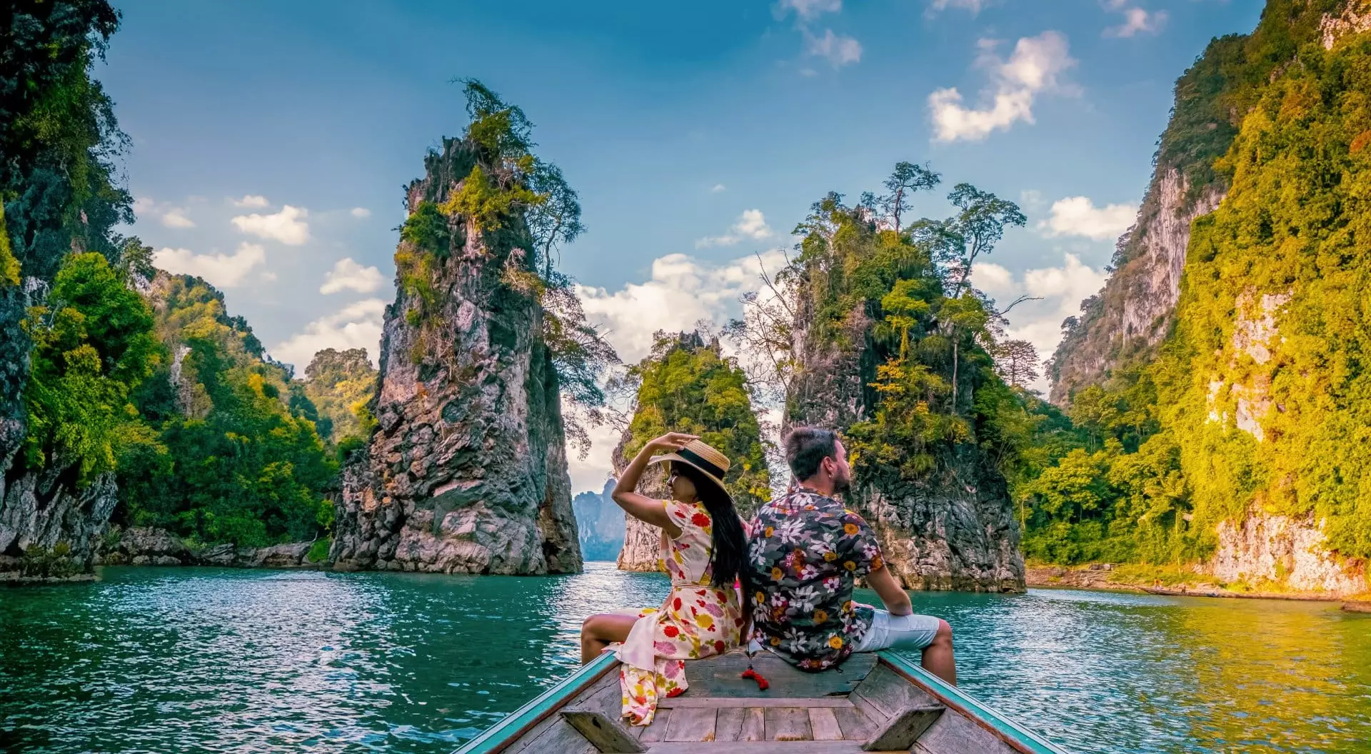 In Khao Sok National Park in Thailand you can boat among towering lime stone cliffs