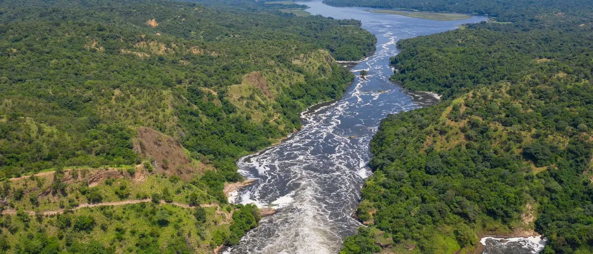 Murchison Falls (also known as Kabalega Falls) at the Nile River in Uganda. The Falls are in the Murchison Falls National Park, which is one of the main tourist destinations in Uganda.
