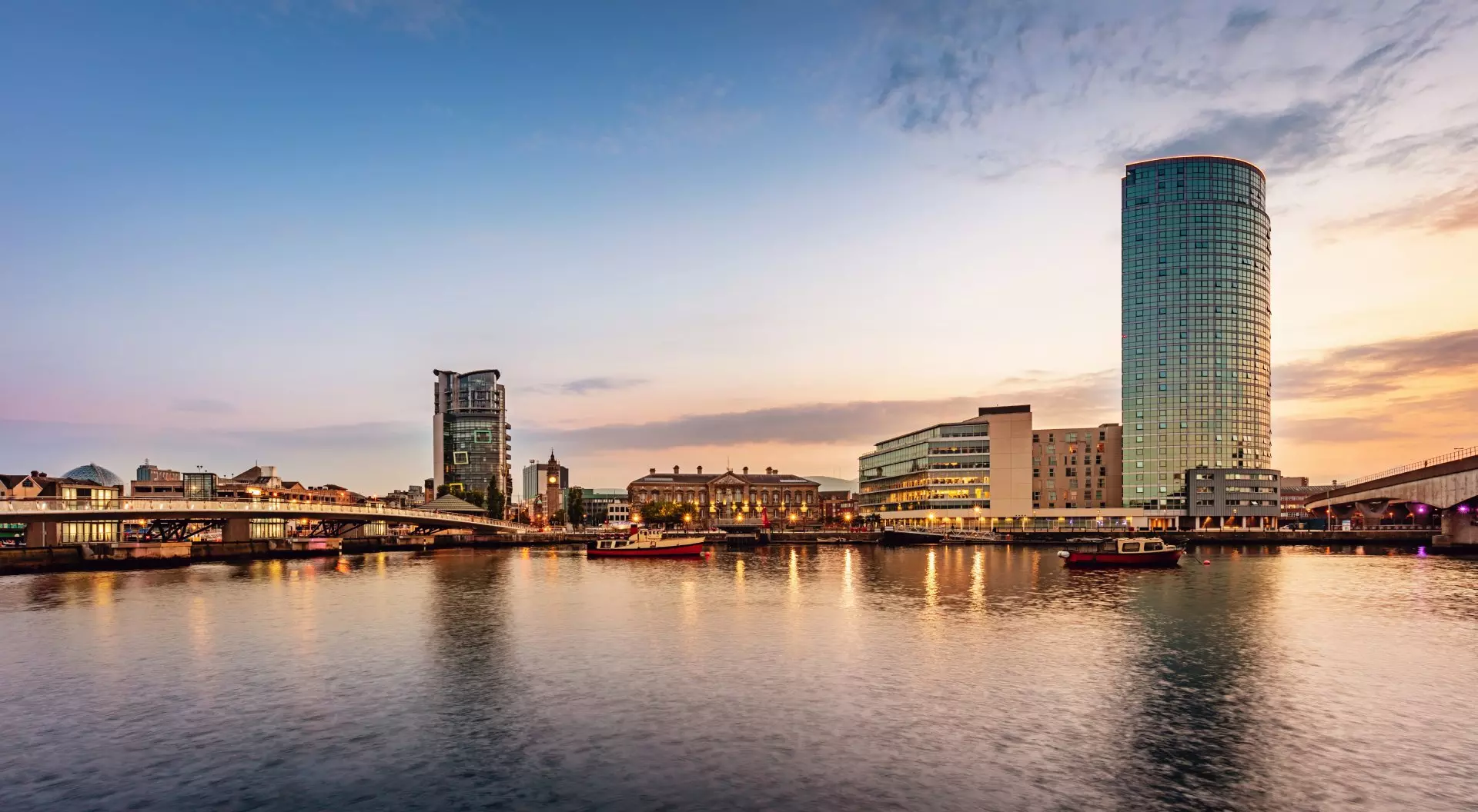 Belfast River Lagan Panorama of Belfast River Lagan Waterfront Cityscape and Lagan Bridge at Sunset Twilight