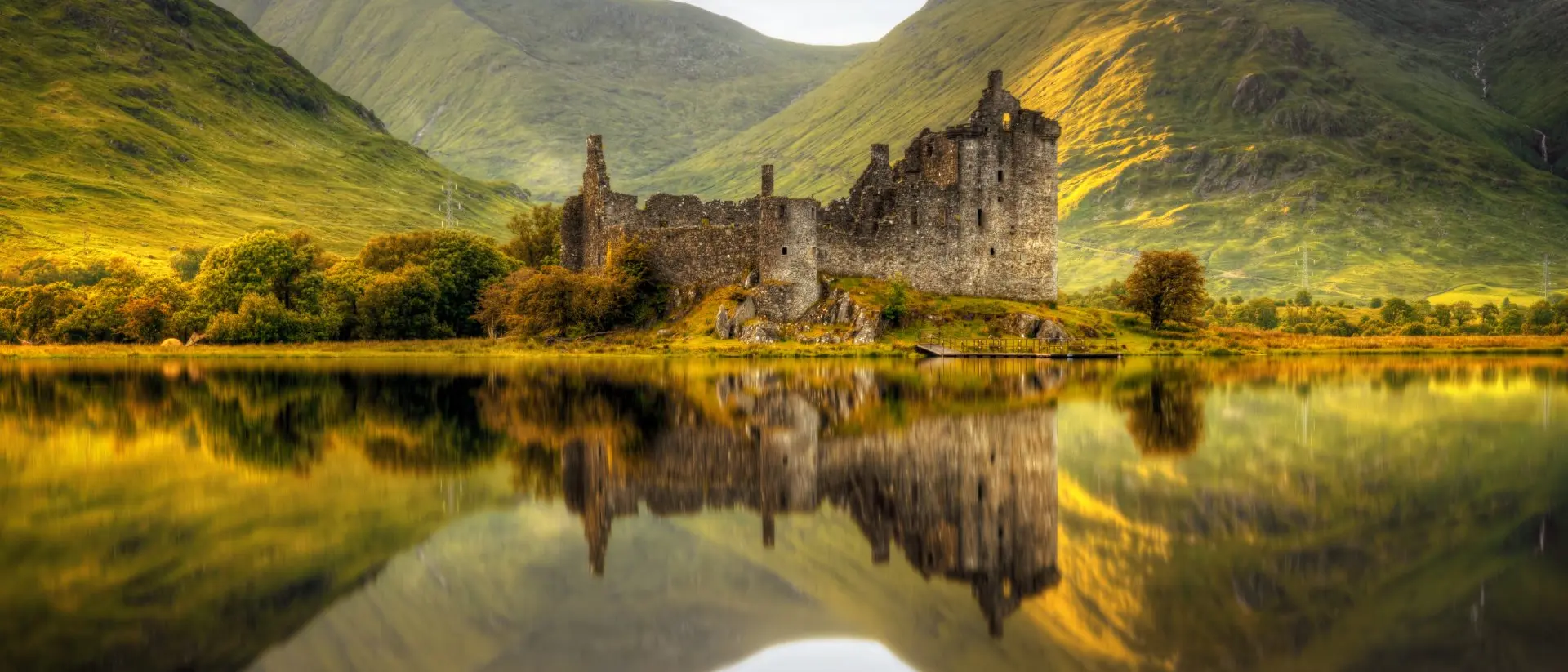 Reflections in Loch Awe at sunset of Kilchurn Castle, Scotland