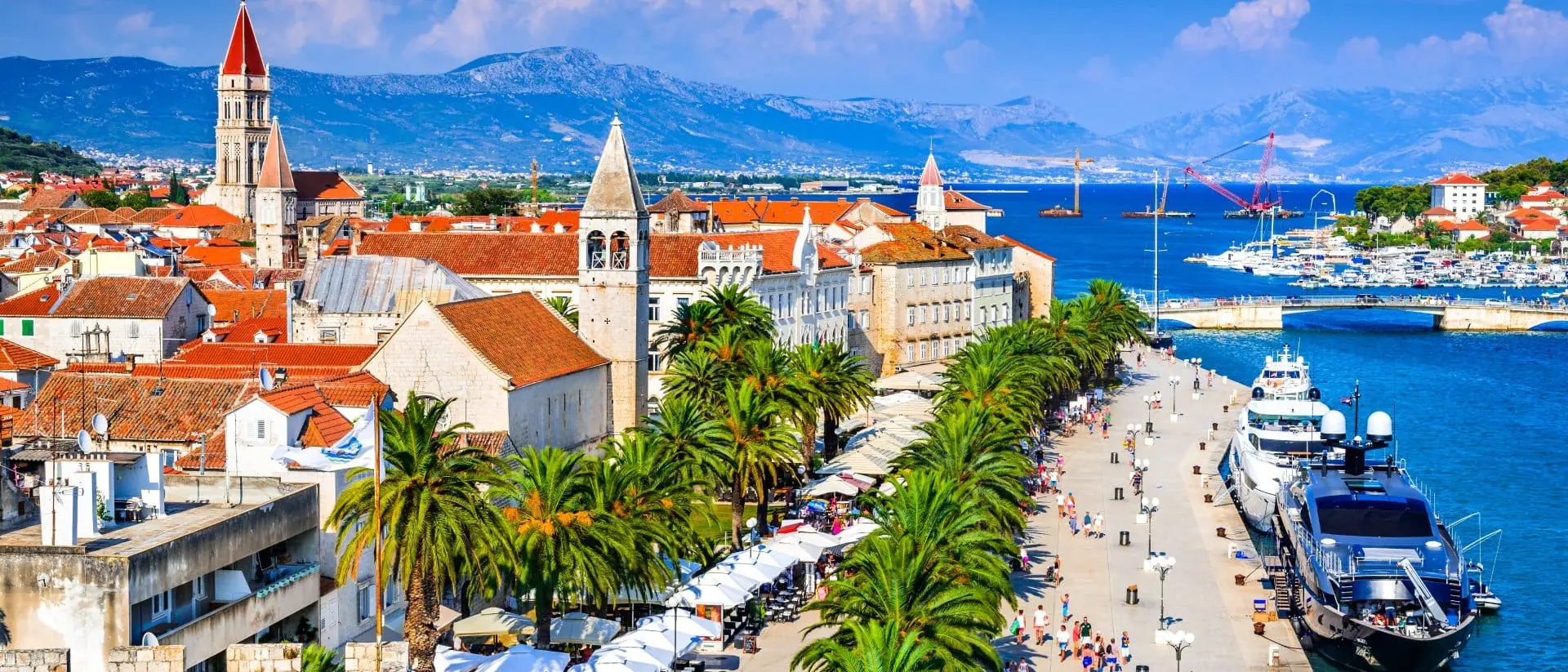 Venetian town, Dalmatian Coast Sunny promenade along the pier of old Venetian town, Dalmatian Coast.