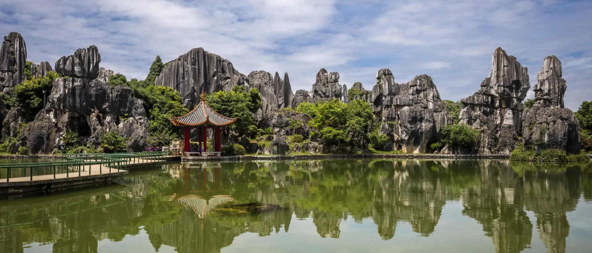 Yunnan Province The Stone Forest or Shilin is a notable set of tall limestone formations that seem to arise from the ground looking like petrified trees