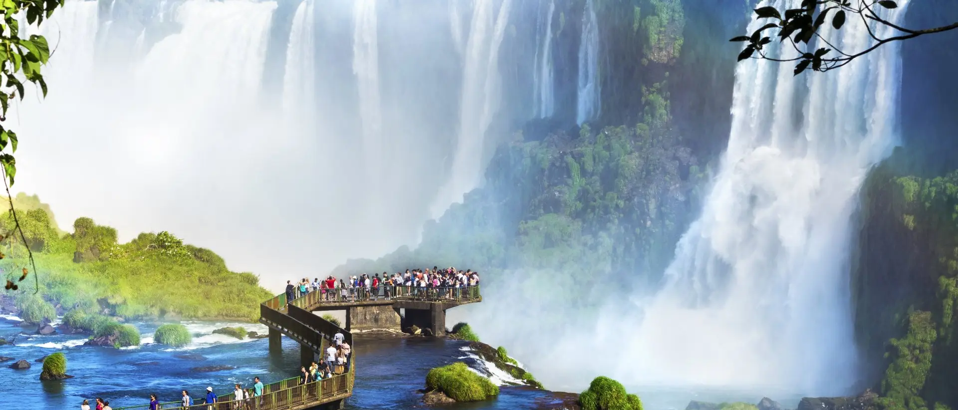 Tourists at Iguazu Falls, one of the world's great natural wonders, on the border of Brazil and Argentina.