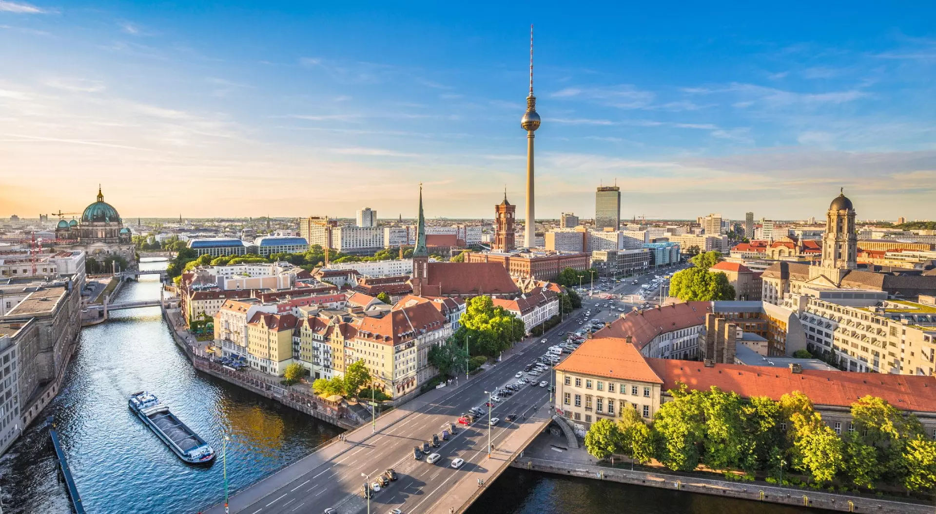 Berlin skyline with Spree river at sunset.