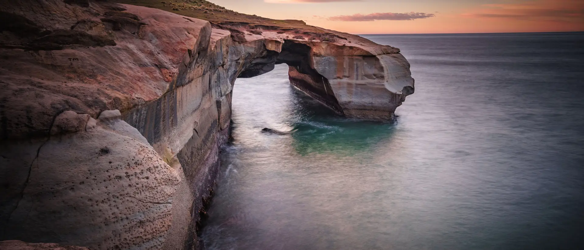 Archway to Harmony, Tunnel Beach A sunrise long exposure at Tunnel Beach, Dunedin - New Zealand