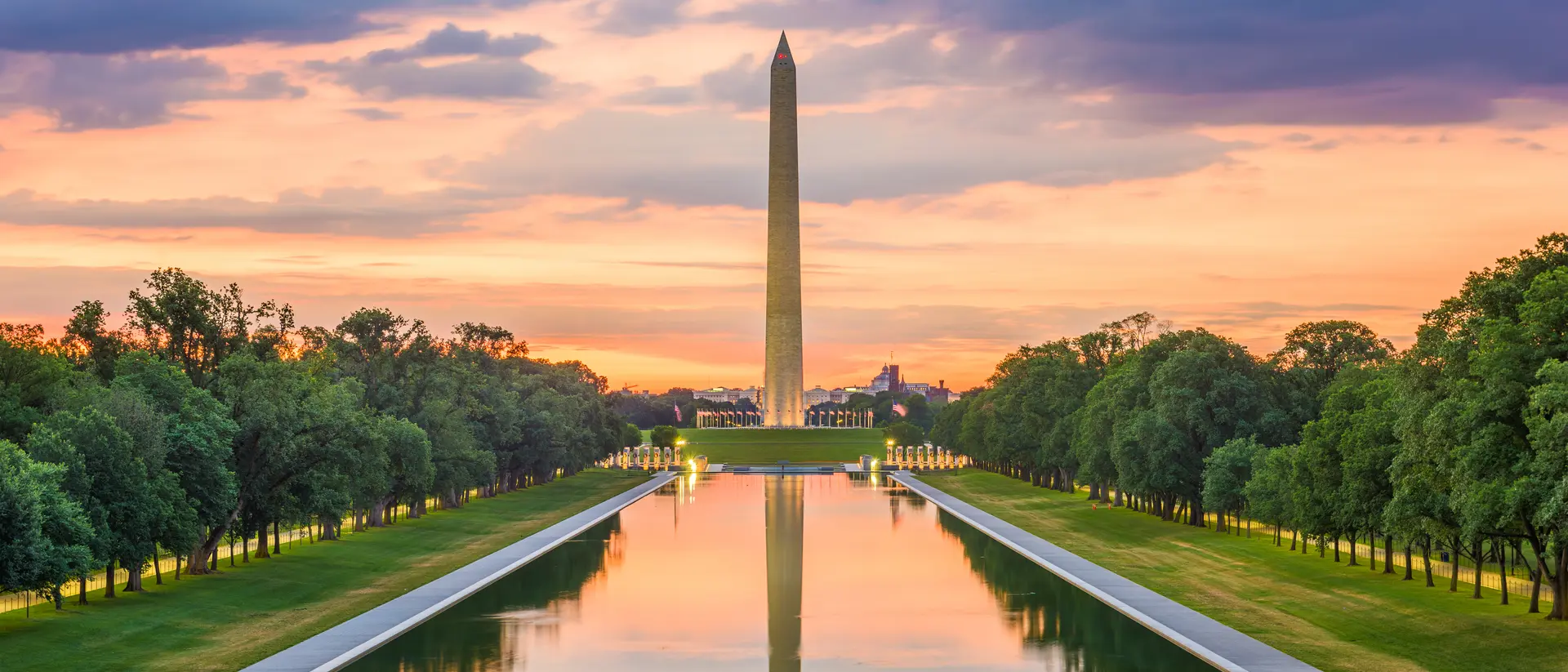 Washington D.C., United States Monument reflecting on pool at dawn