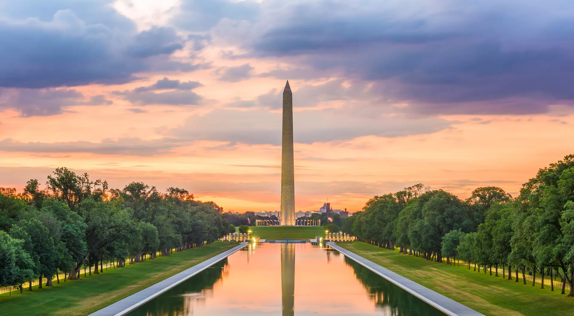 Washington D.C., United States Monument reflecting on pool at dawn