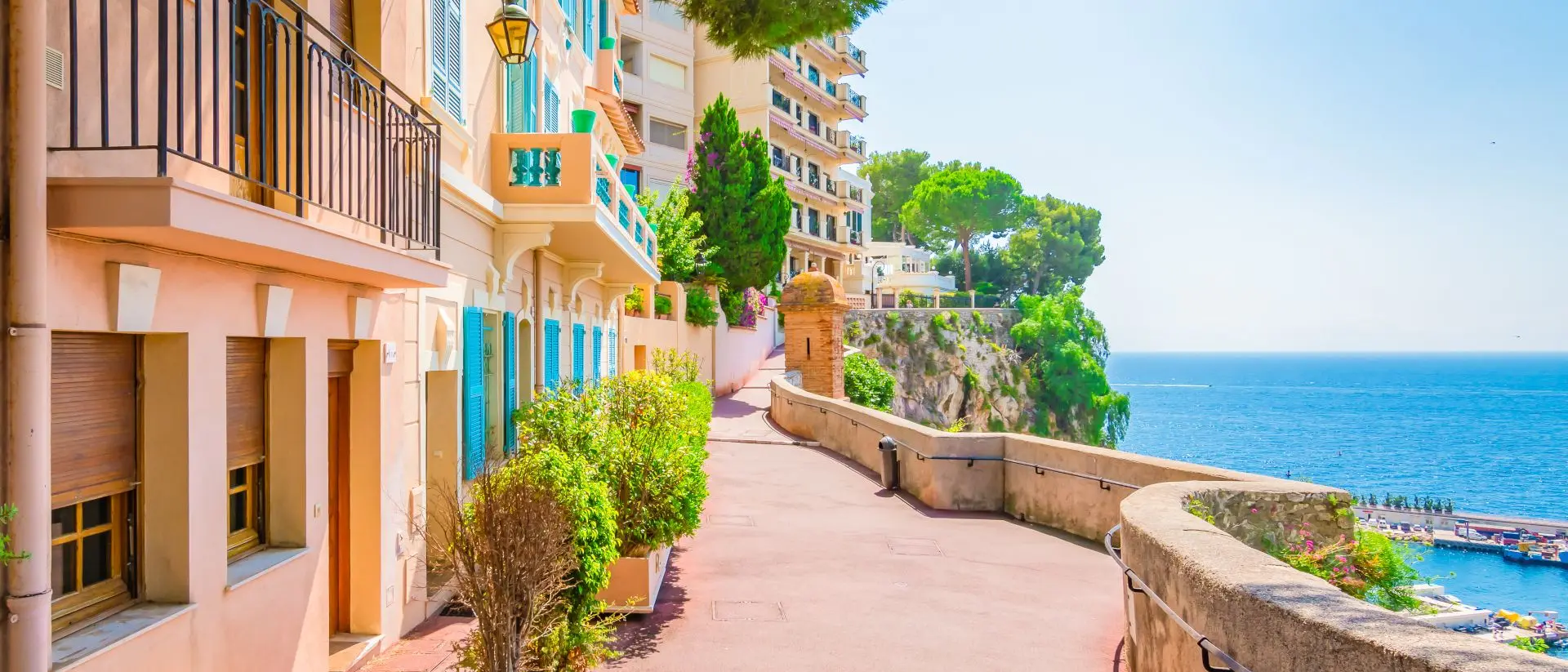 Monte Carlo, Monaco Typical walking street with colorful houses along the seaside of Monaco