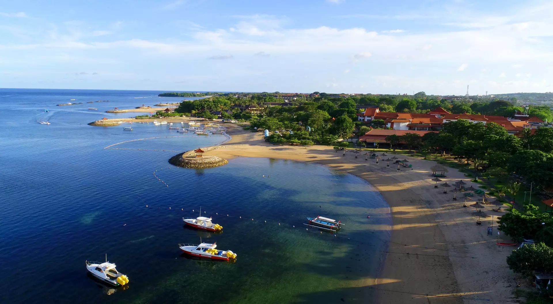 Tanjung Benoa Beach Beautiful aerial view of Tanjung Benoa Beach with boats in the water