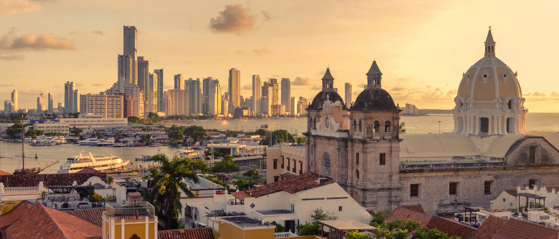 View of the historic center of Cartagena, Colombia with the Caribbean Sea and skyscrapers visible in the background