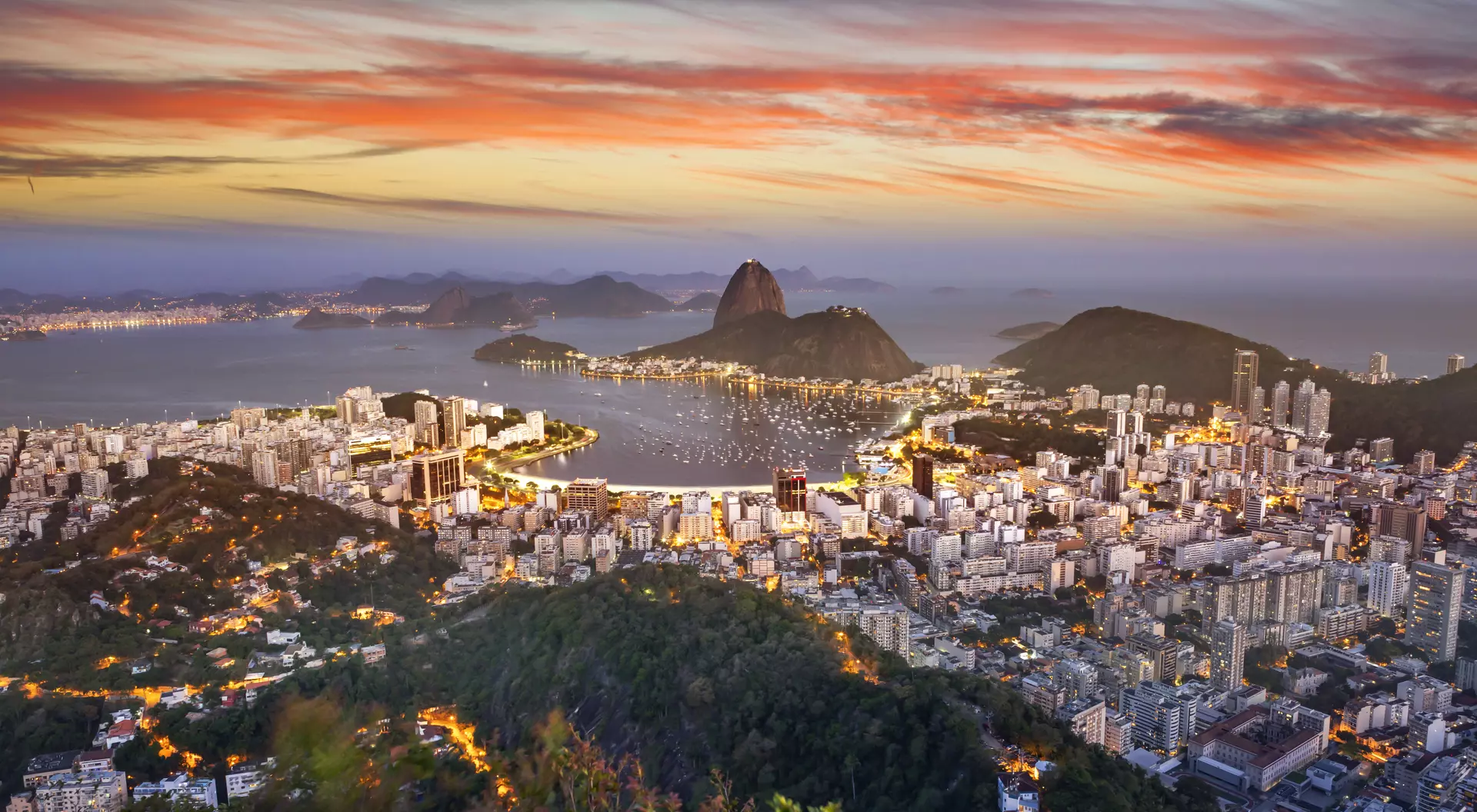 Guanabara Bay Aerial view of Rio de Janeiro Brazil with Guanabara Bay and Sugar Loaf at dusk