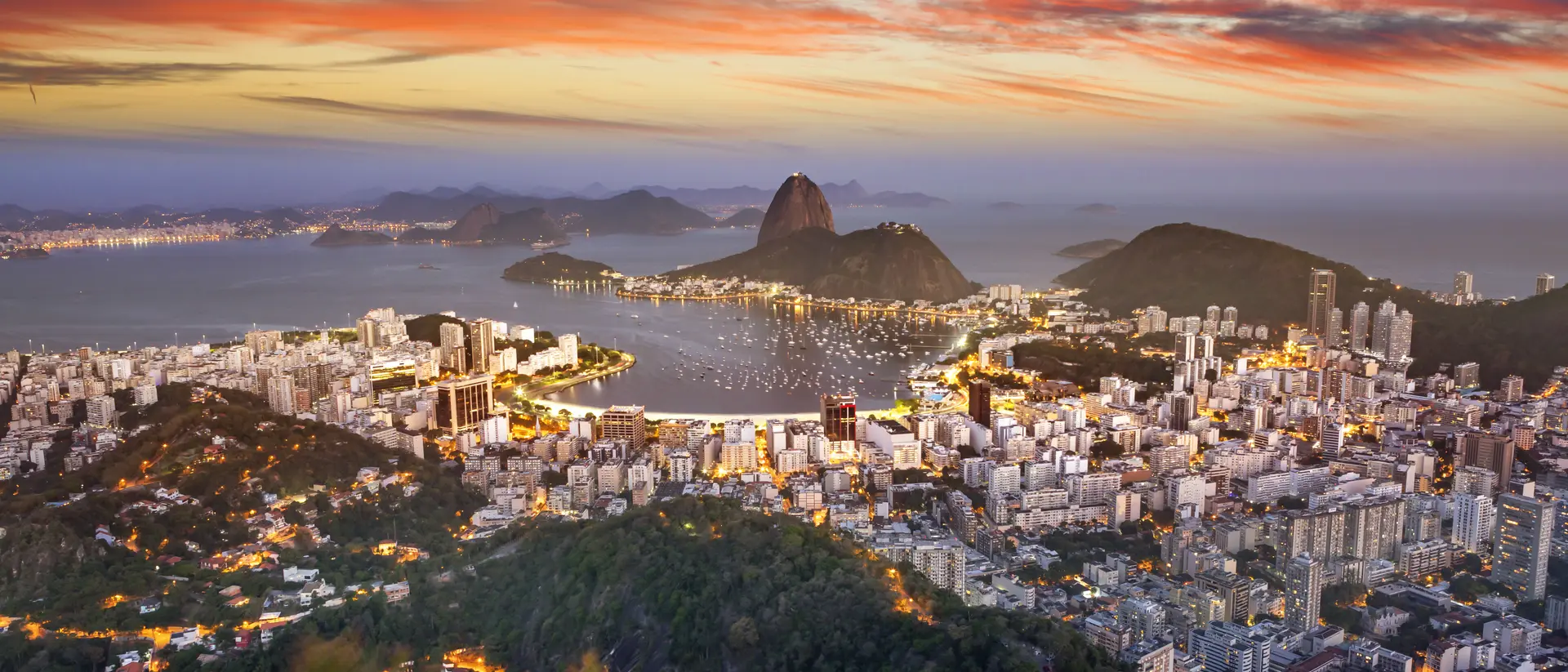 Aerial view of Rio de Janeiro Brazil with Guanabara Bay and Sugar Loaf at dusk
