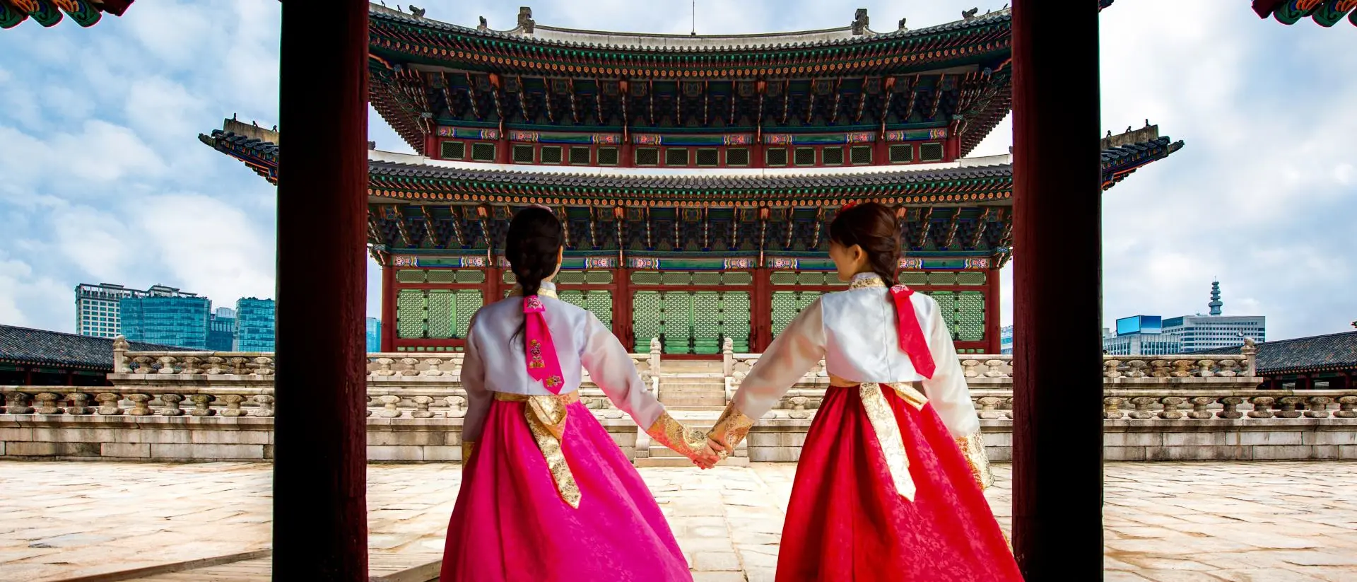 Gyeongbokgung Palace Korean women in Hanbok or Korean Gress, walking at Gyeongbokgung Palace in Seoul, South Korea