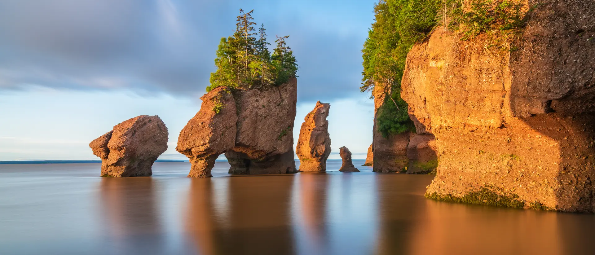 Saint John, Canada Hopewill Rock at sunrise during high tide in the Bay of Fundy