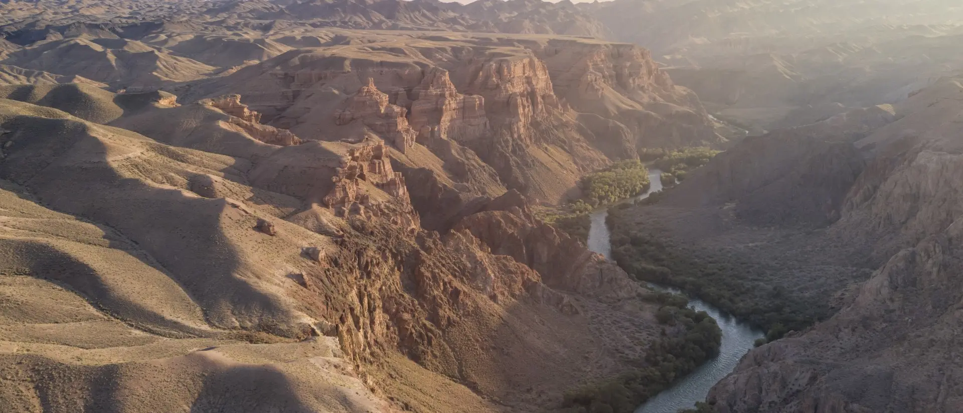 Aerial view of the Charyn Canyon and Charyn River in Kazakhstan, Central Asia, at sunset