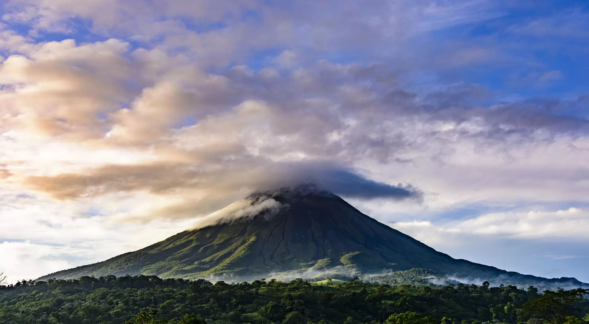 The famous Arenal Volcano in Costa Rica Dramatic skies over the Arenal Volcano, Costa Rica