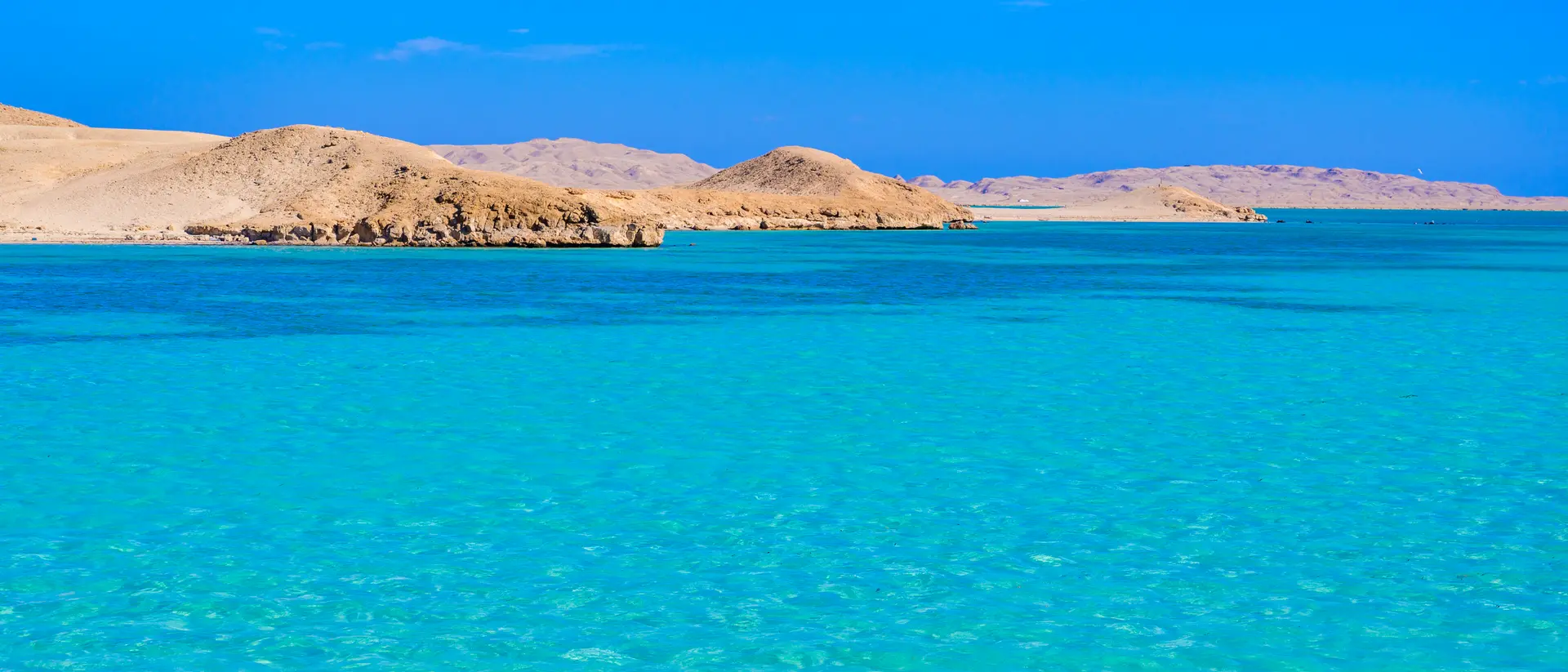 Giftun Islands, Red Sea Orange Bay Beach with crystal clear azure water and white beach