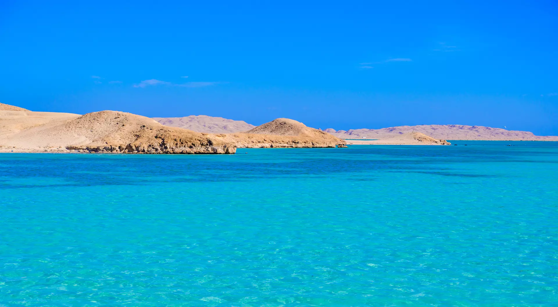 Giftun Islands, Red Sea Orange Bay Beach with crystal clear azure water and white beach