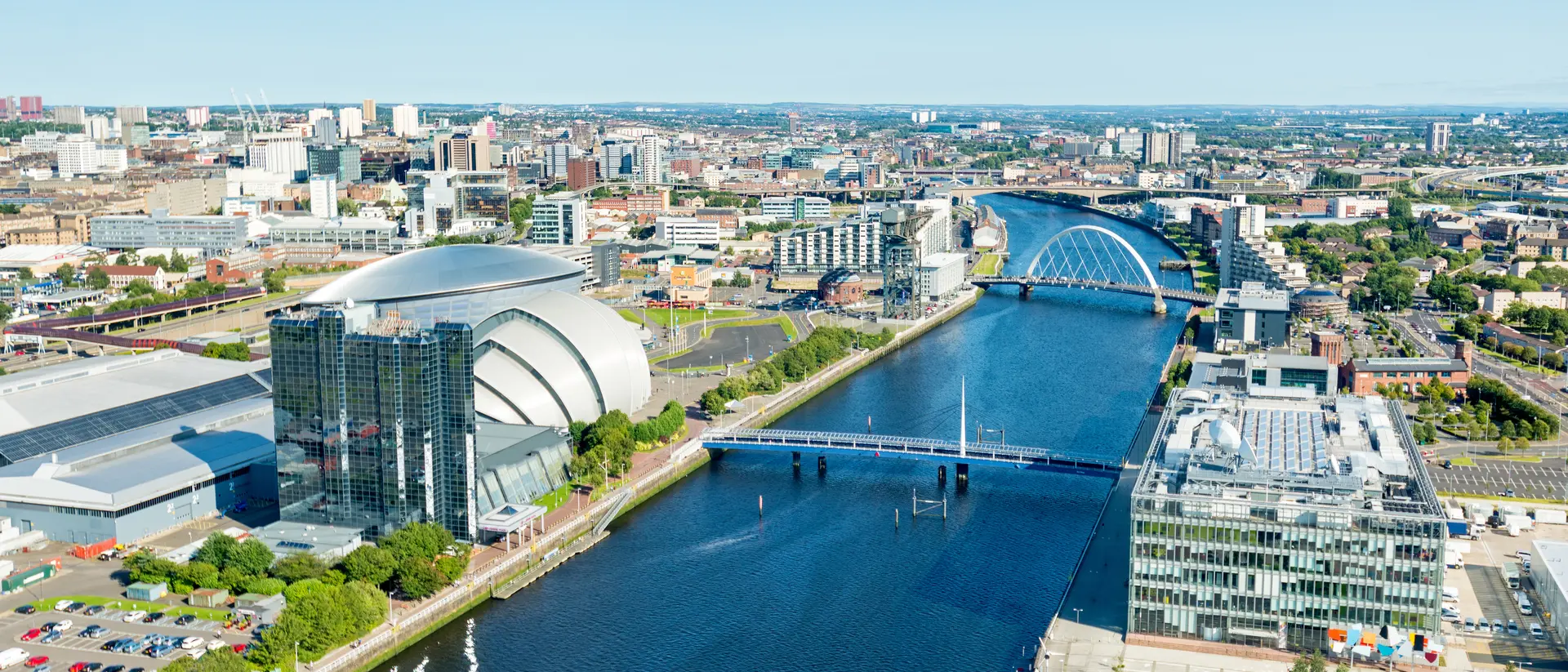 River Clyde Wide angle view of the Finnieston Crane and SSE Hydro arena, Clyde Arc on the banks of the River Clyde
