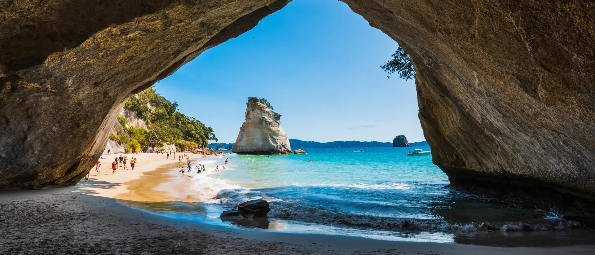 Stunning cove with view of white sand beach and blue waters on the other side