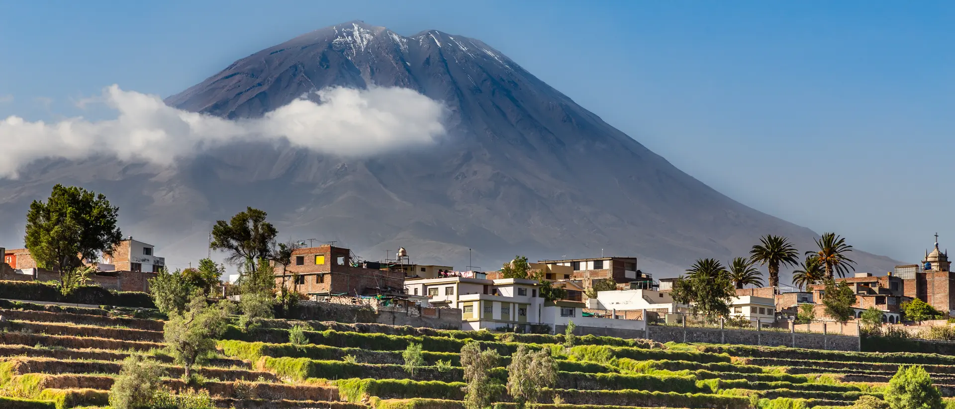 Misti Volcano Dormant Misti Volcano over the fields and houses of peruvian city of Arequipa, Peru